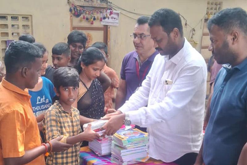 Providing note books and stationary to students