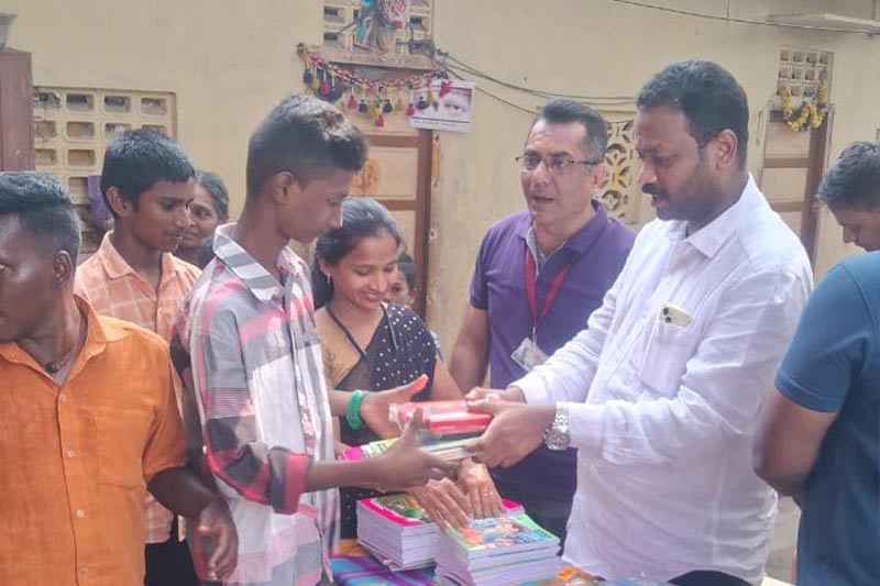 Providing note books and stationary to students