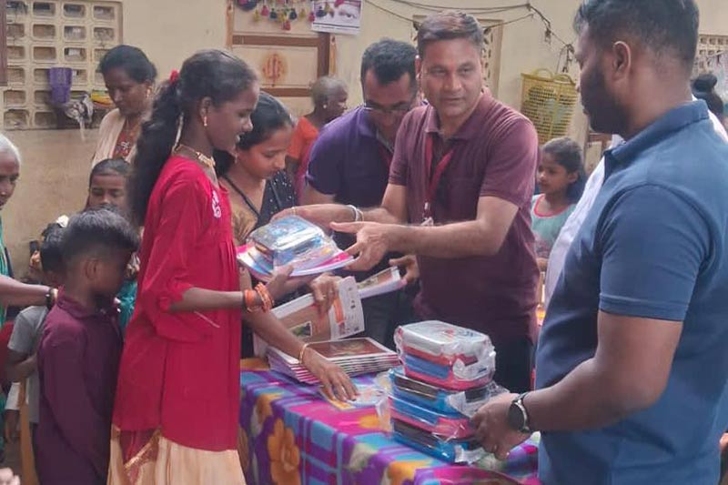 Providing note books and stationary to students