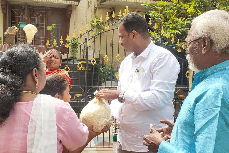 Distributed 5 kg rice bags to differently-abled in