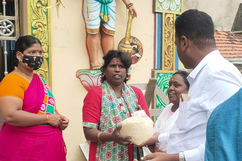 Distributed 5 kg rice bags to differently-abled in